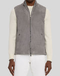  Front view of grey leather suede vest on model