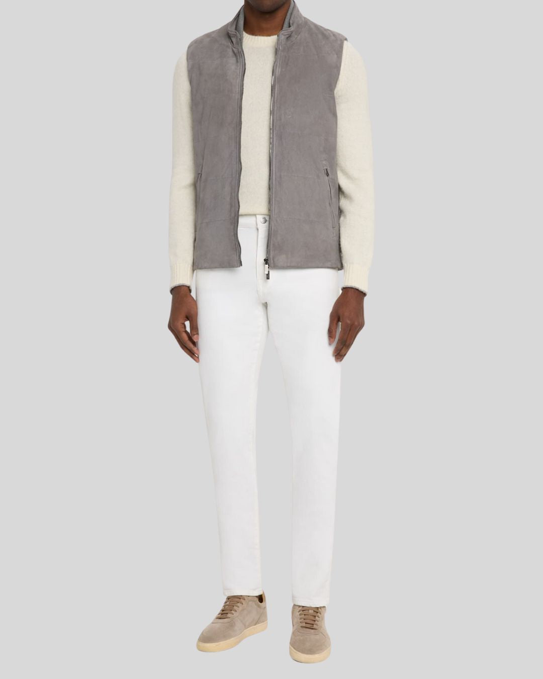  Front view of grey leather suede vest on model
