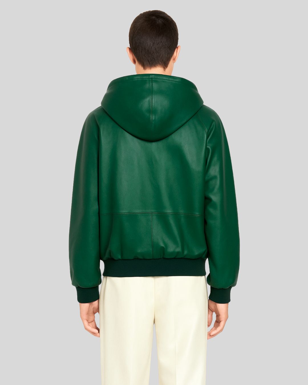 Back view of green lambskin hoodie bomber jacket for men