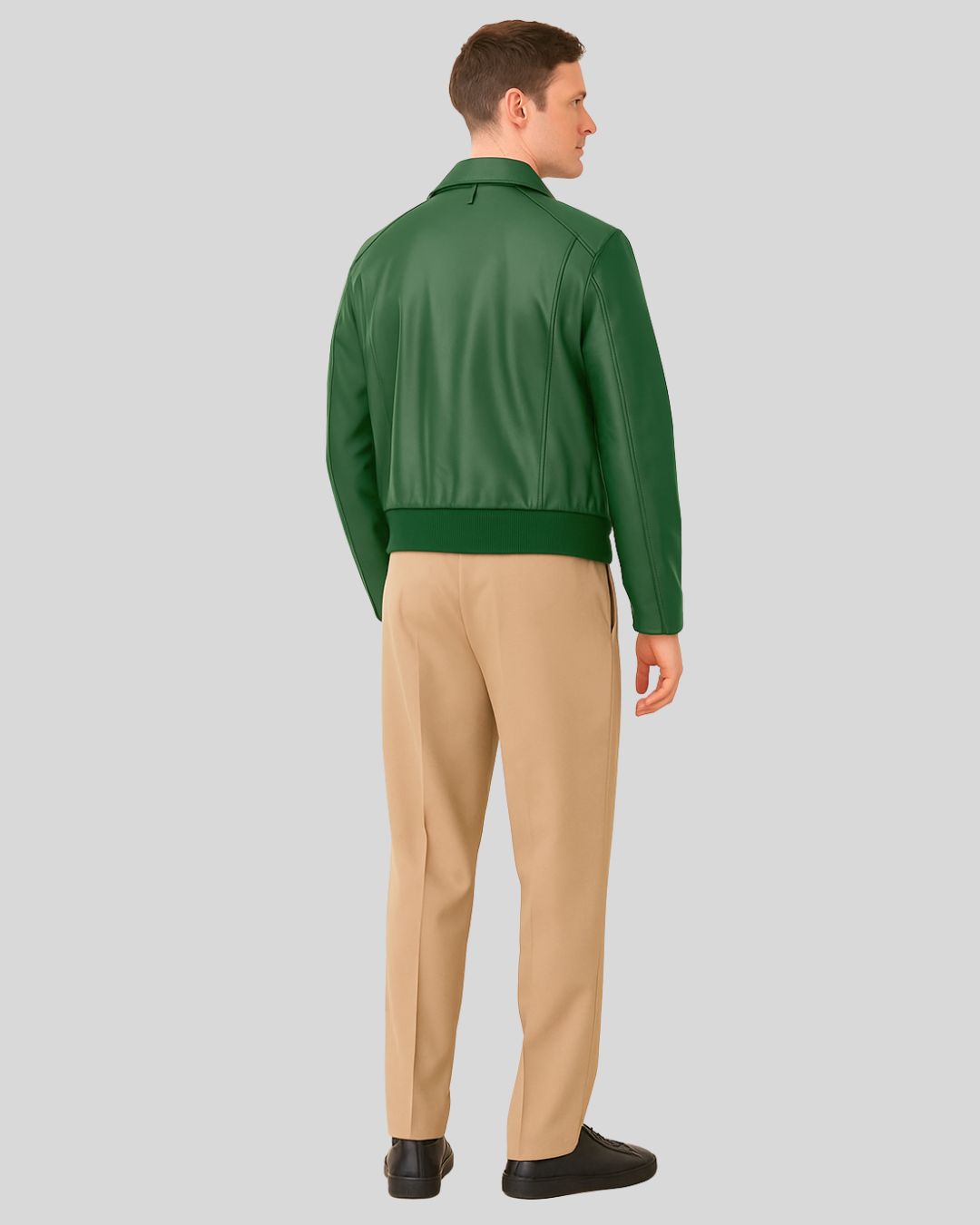 Back view of the green leather bomber jacket with ribbed waist hem and collar.