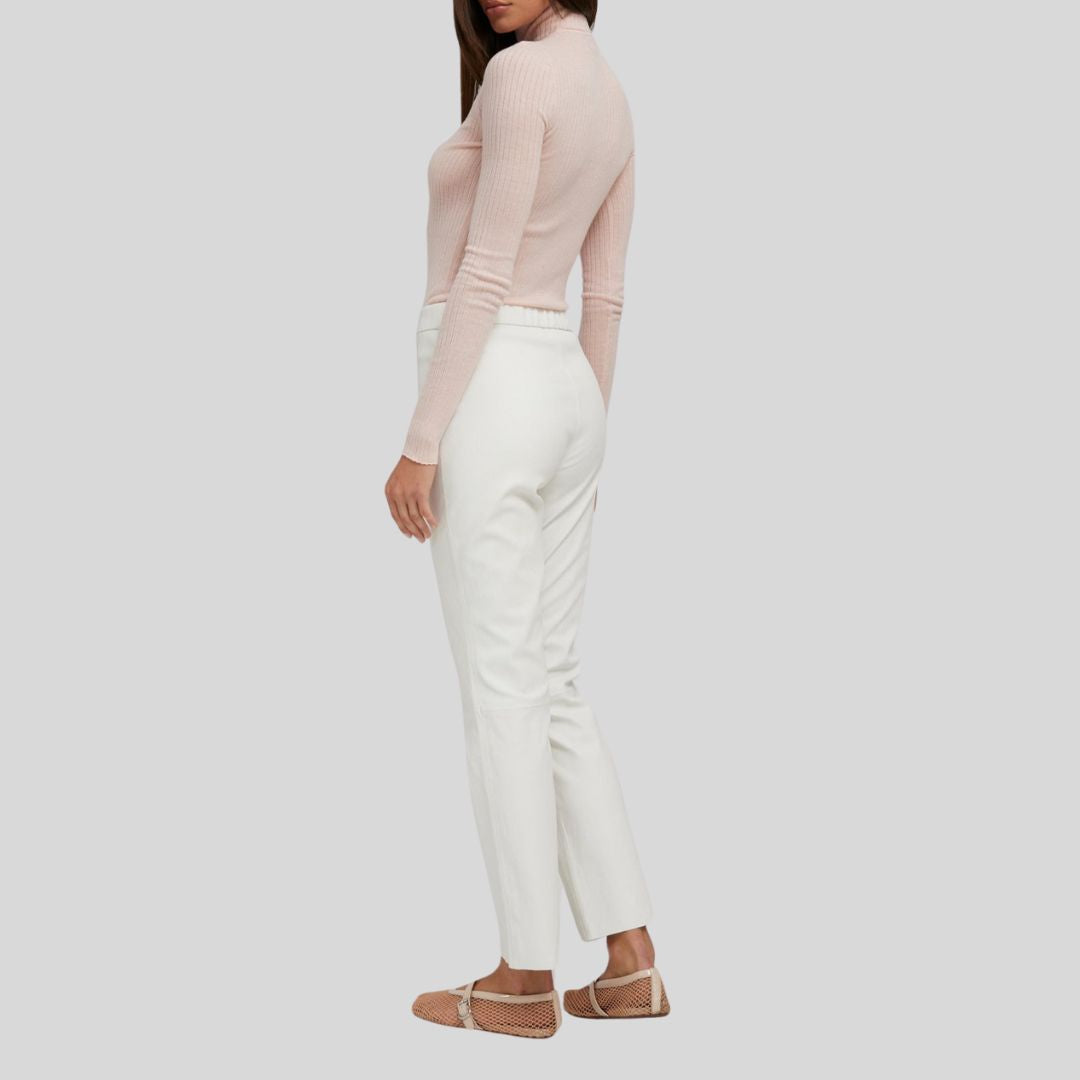Back view of Ivory Luxe slim white leather pants
