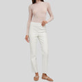 Front view of Ivory Luxe white leather pants for women