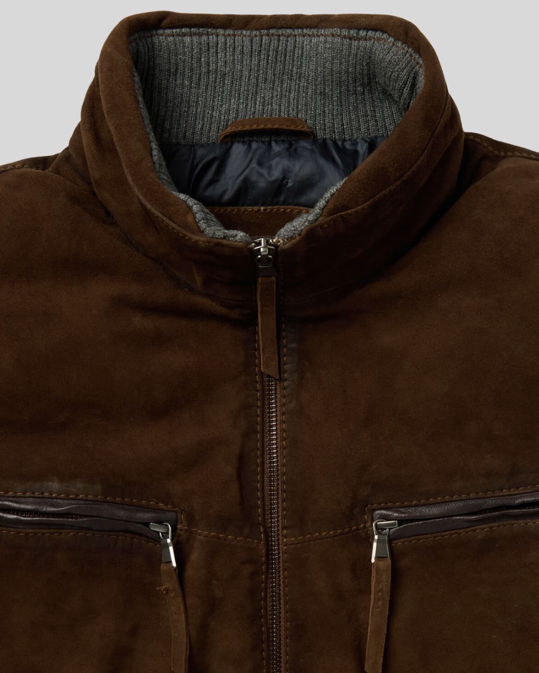 close-up of suede zip-up jacket chest pocket and collar