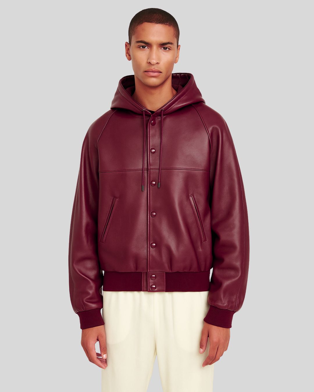 Front view of maroon hooded leather bomber jacket for men