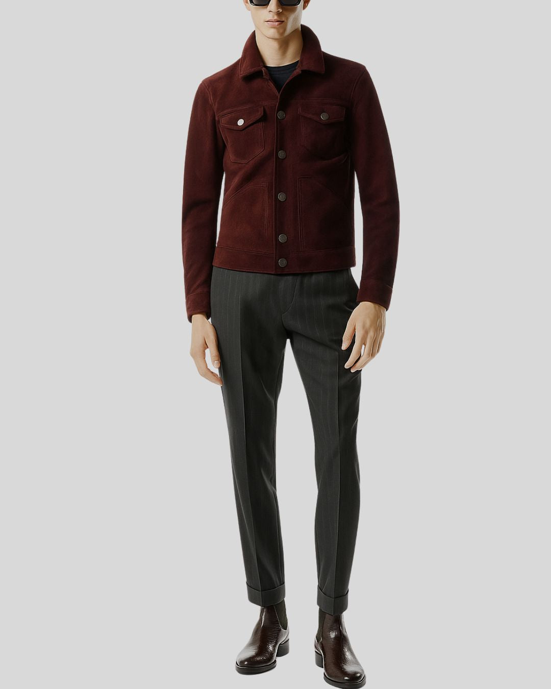 Man wearing men’s burgundy suede shirt jacket with dress trousers