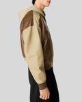 Side profile of two-tone hooded leather bomber jacket for men