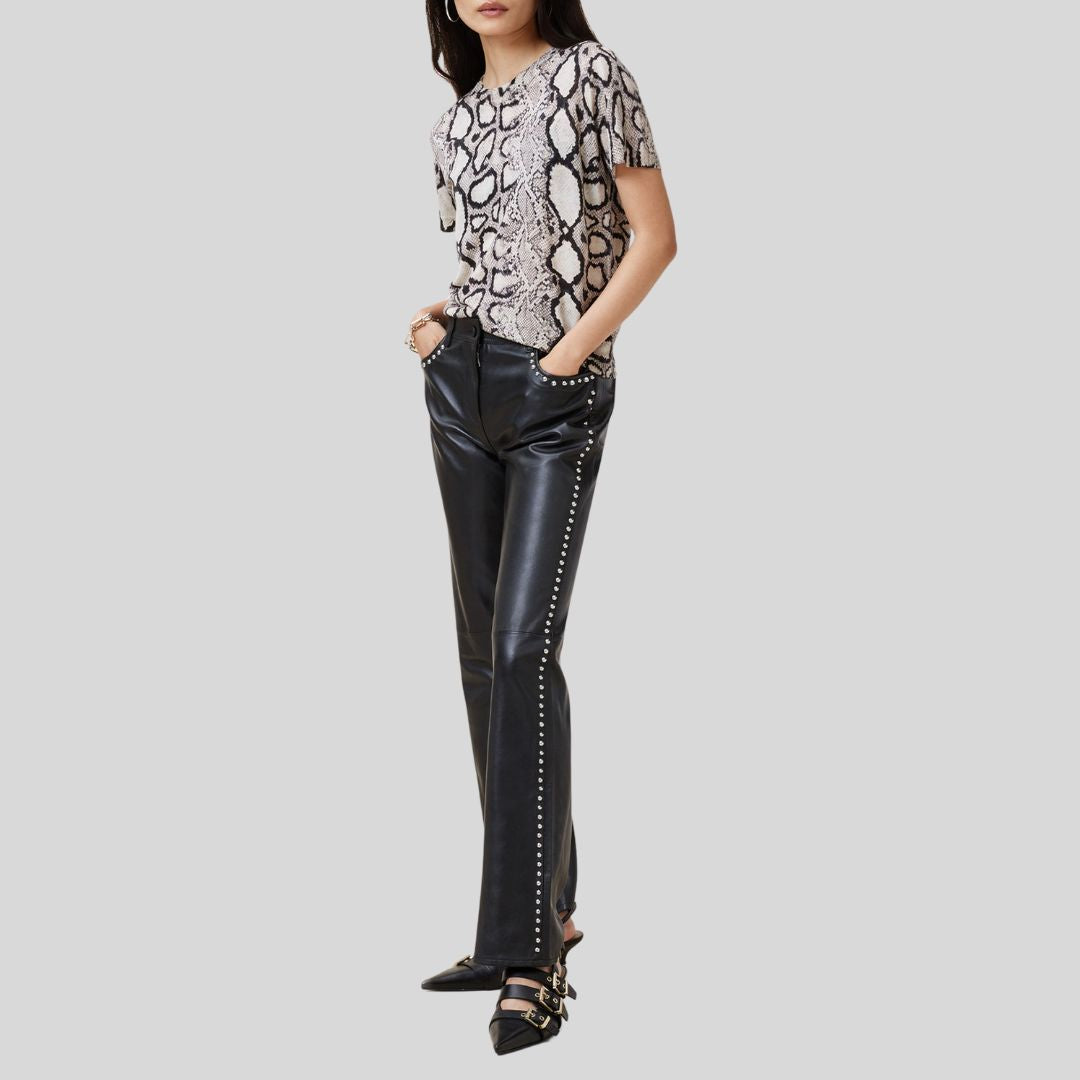 front view of black studded leather pants for women