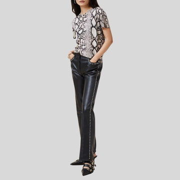 front view of black studded leather pants for women