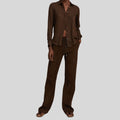 front view of dark brown suede pants for women