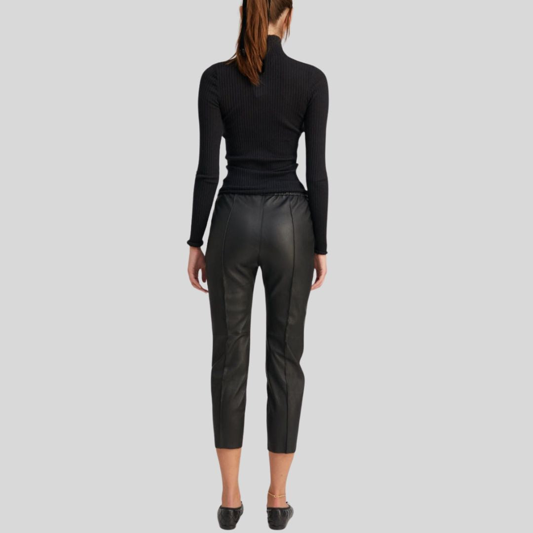 front view of womens black leather cropped pants