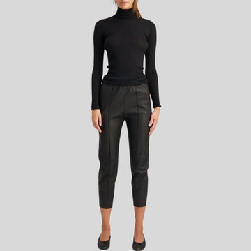 close-up of satin lined black leather cropped pants