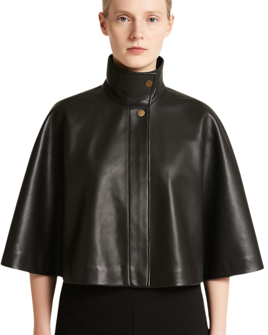 Front view of black suede poncho capelet worn by woman