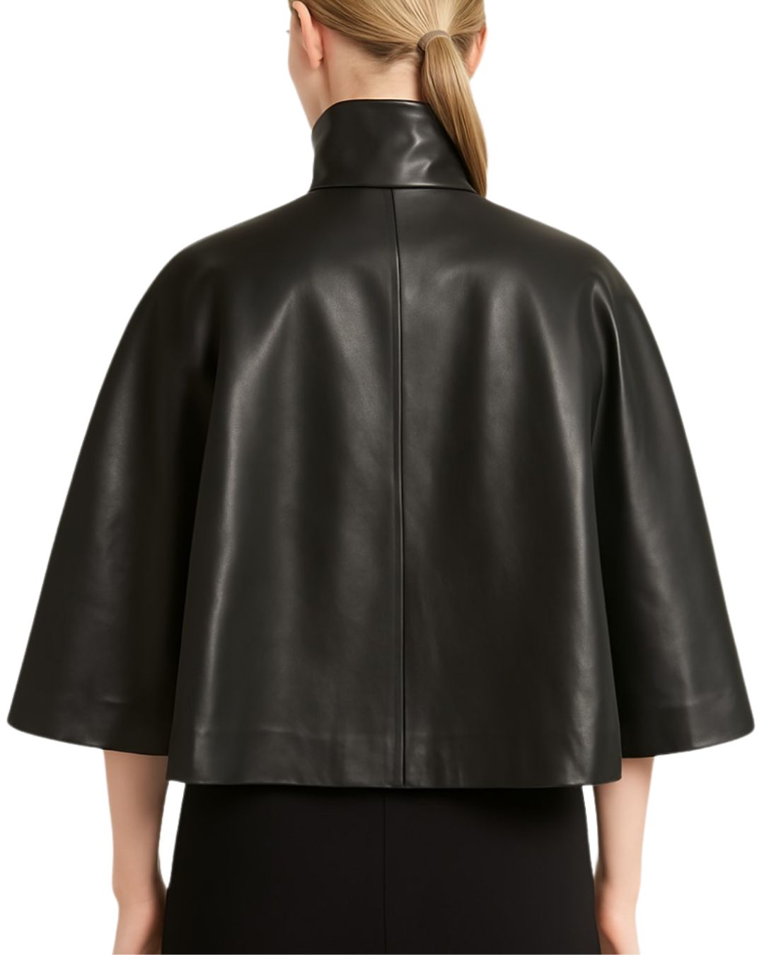 Front view of black suede poncho capelet worn by woman