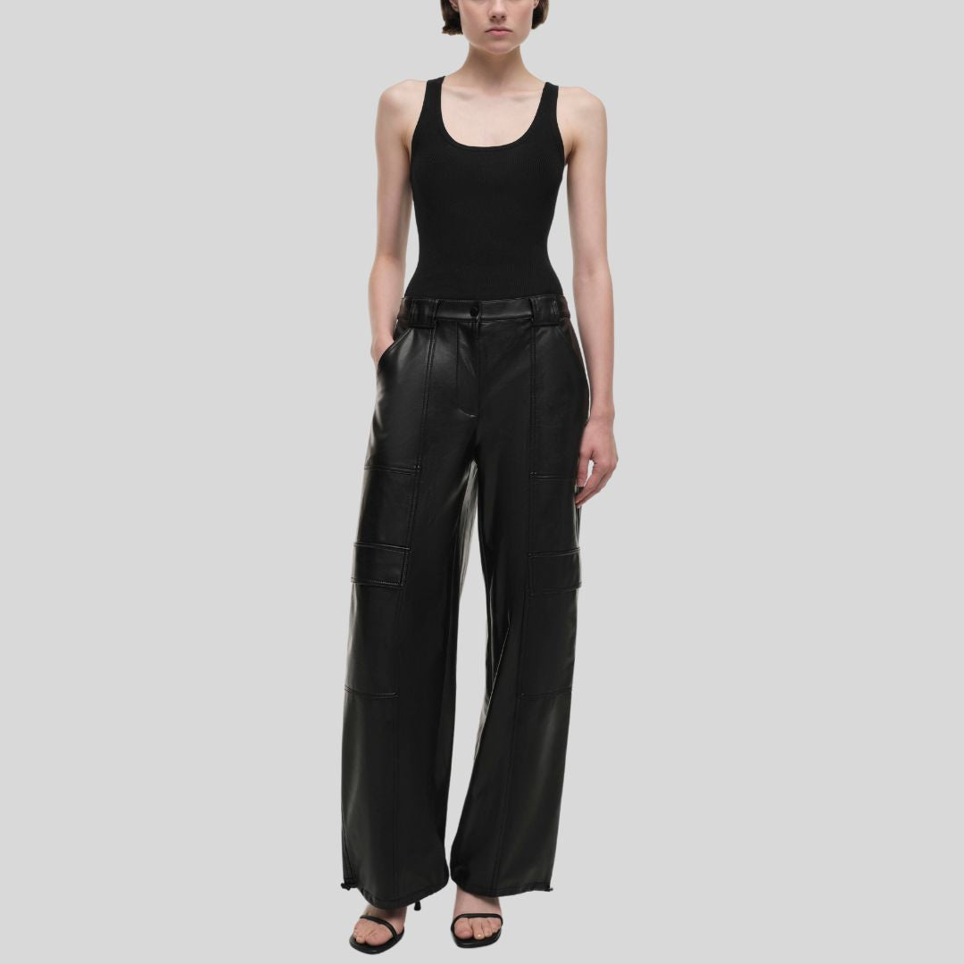 front view of womens black baggy leather pants