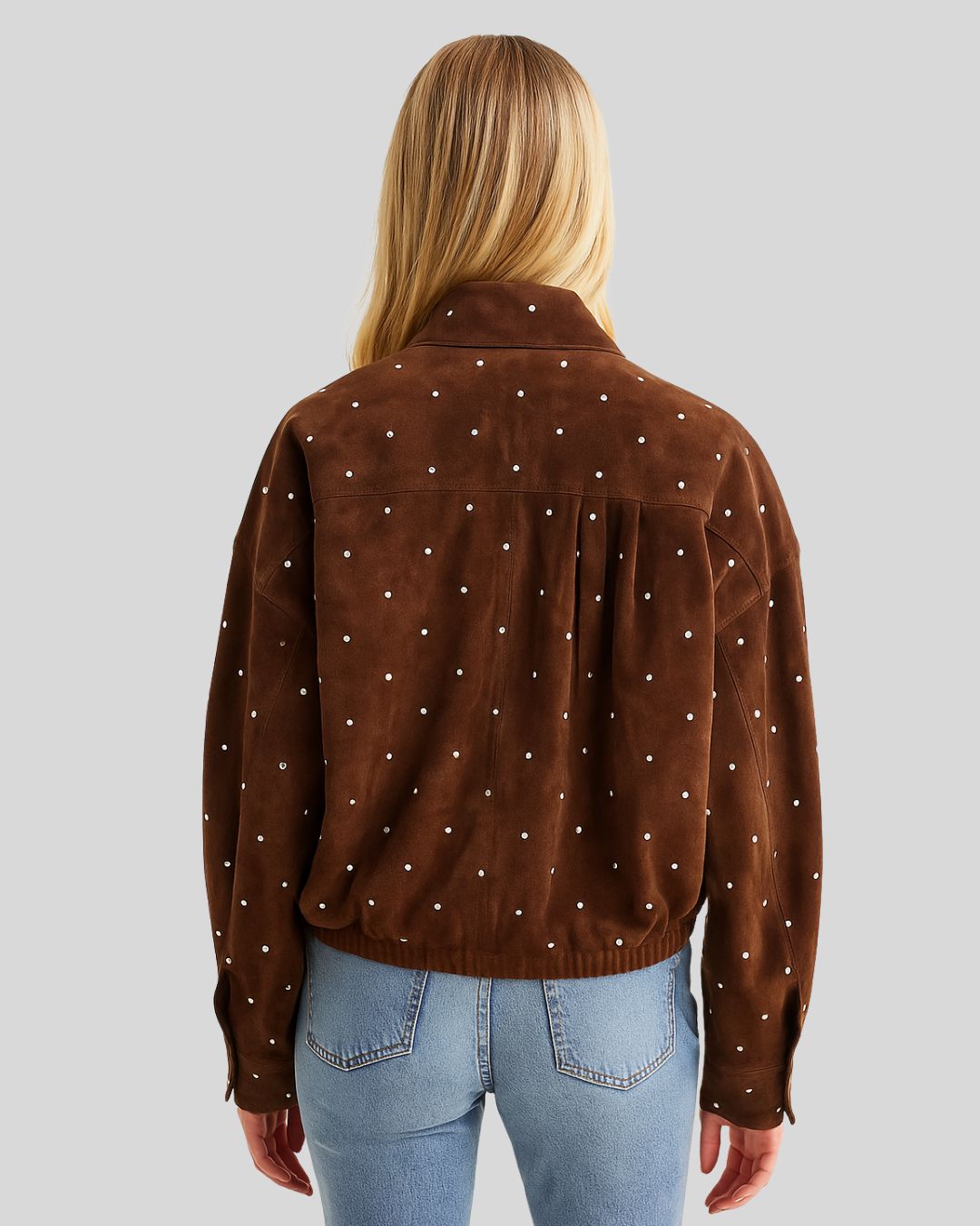 Model showing back of brown pearl-embellished suede jacket
