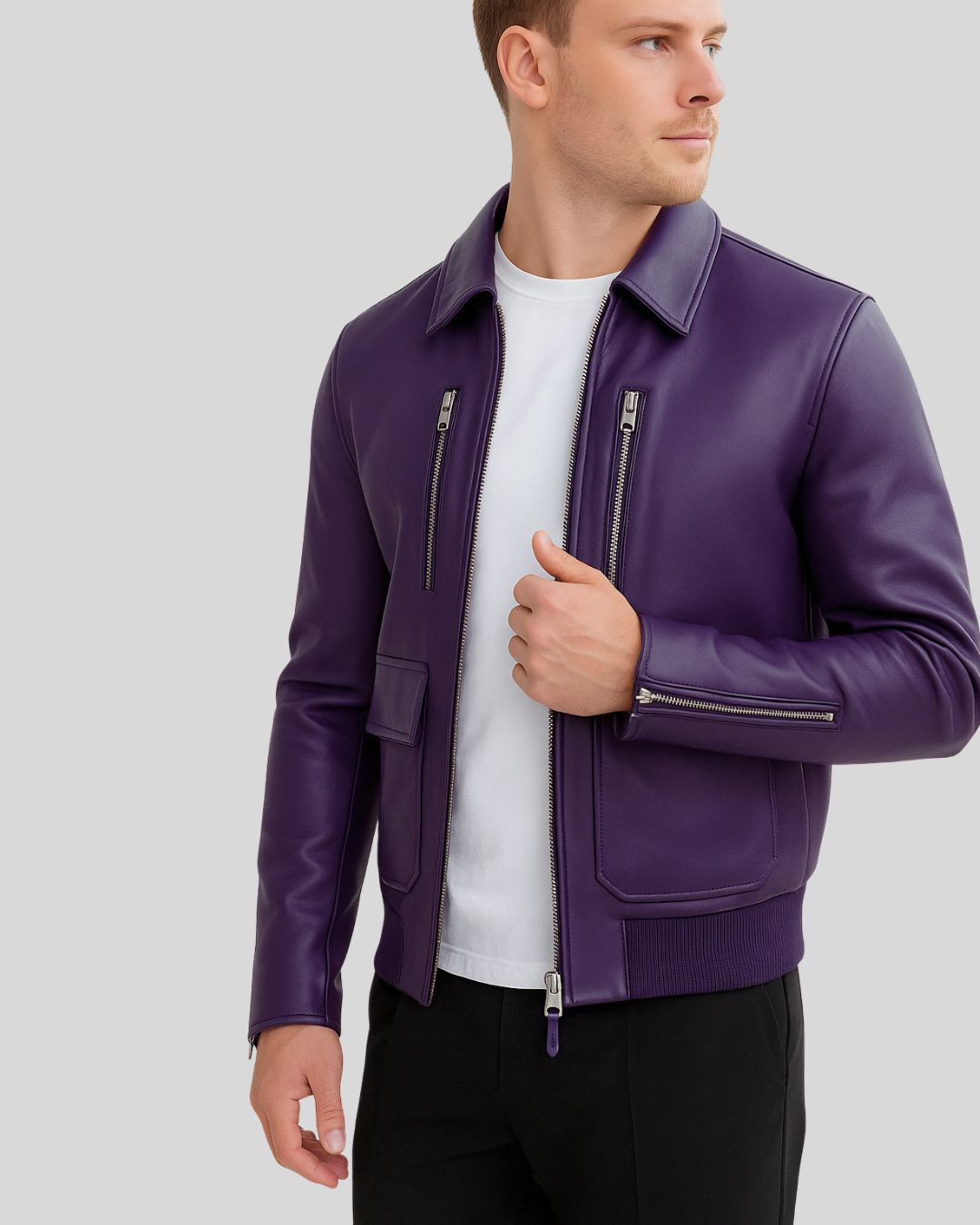 Man wearing purple bomber jacket with partially unzipped front
