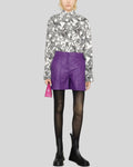 Front view of purple leather shorts women with high waisted tailored fit