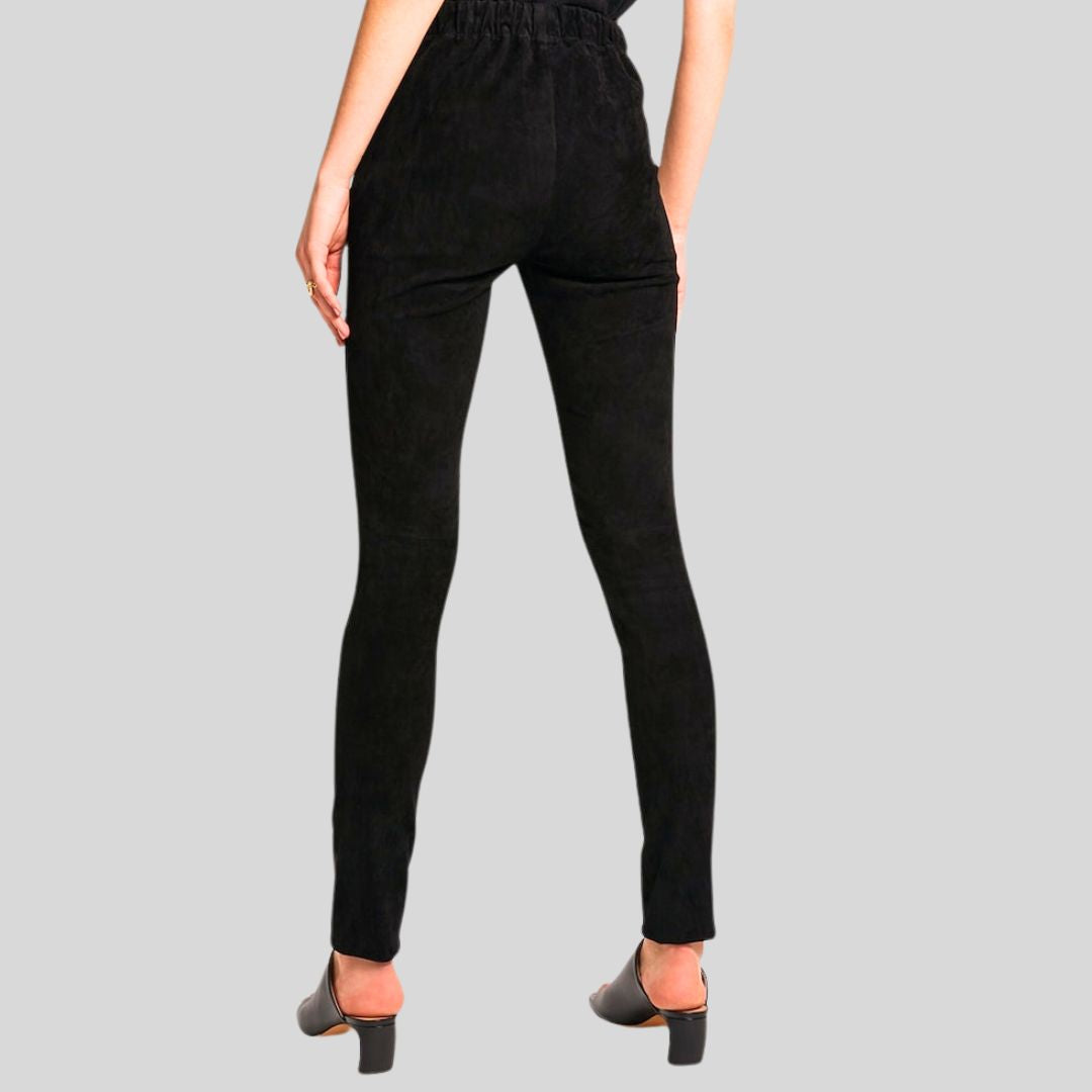back view of black suede high waisted skinny pants