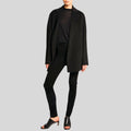 front view of black suede skinny pants for women
