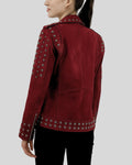 Rear view of burgundy suede biker jacket with studded hem and shoulders
