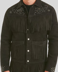Close-up of rhinestone and fringe detail on black suede jacket