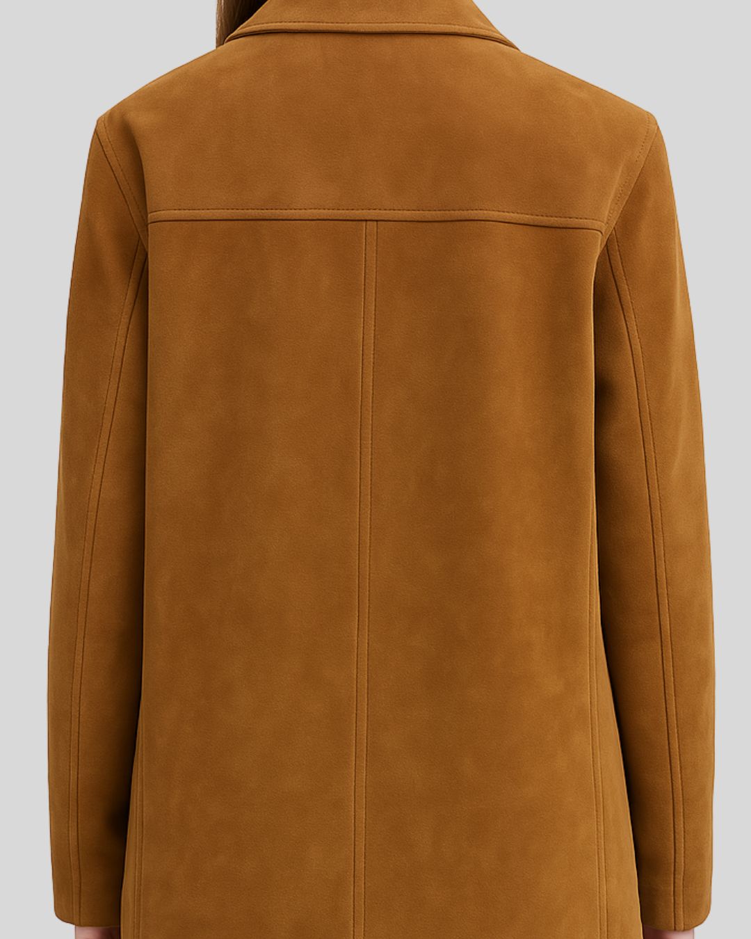 Close-up of back seams and suede texture on camel field jacket