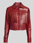  Studio flat lay of red fringe leather jacket on neutral background
