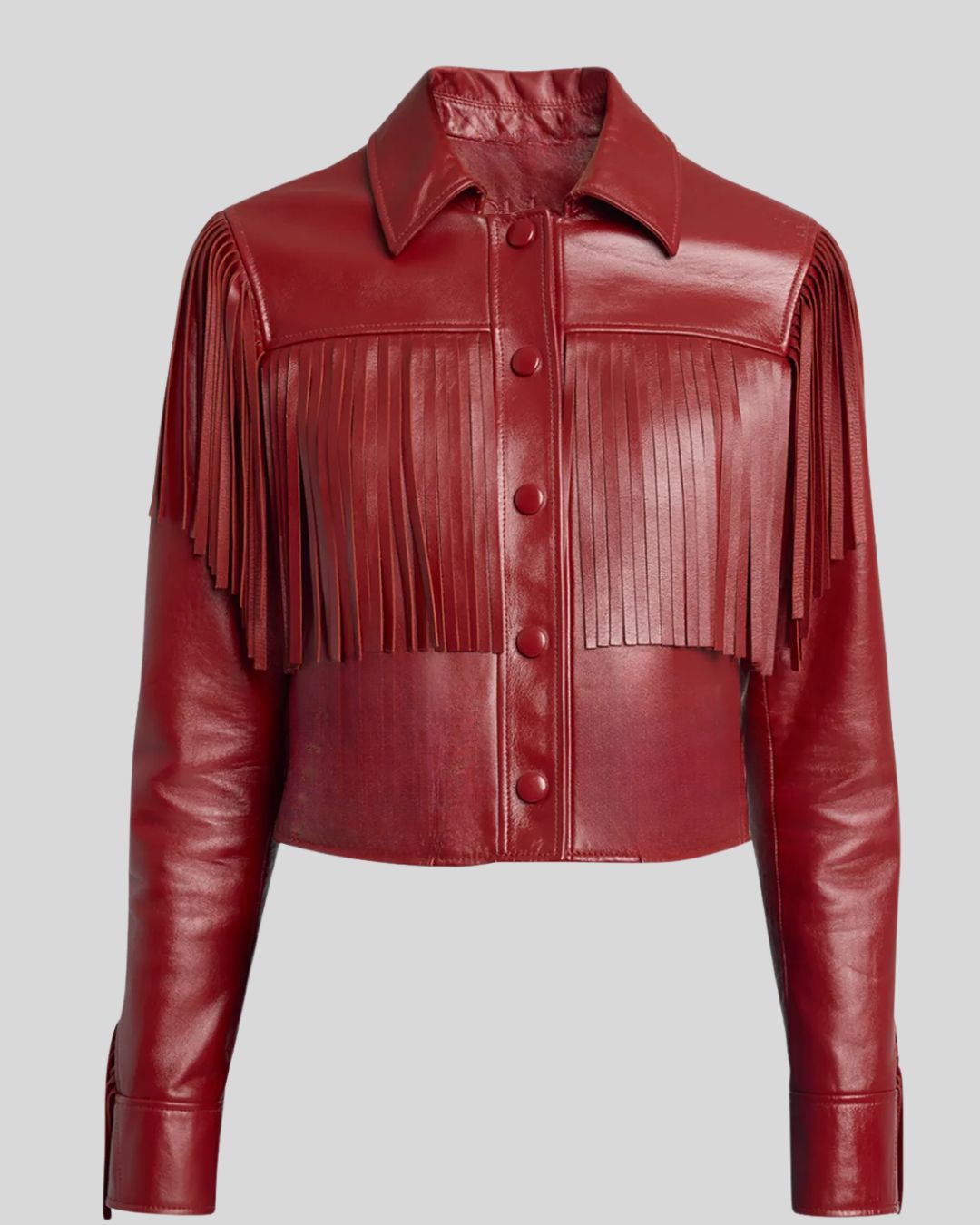  Studio flat lay of red fringe leather jacket on neutral background
