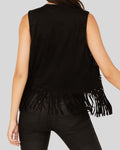  Back view of black suede vest with long fringes along hem
