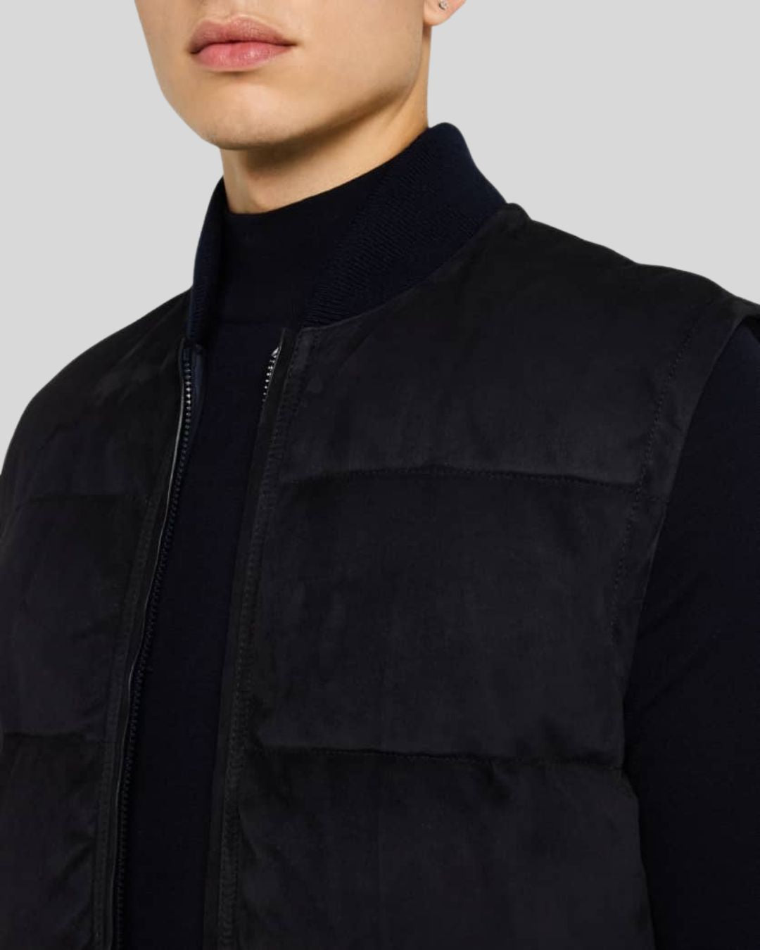 close-up texture of black suede vest