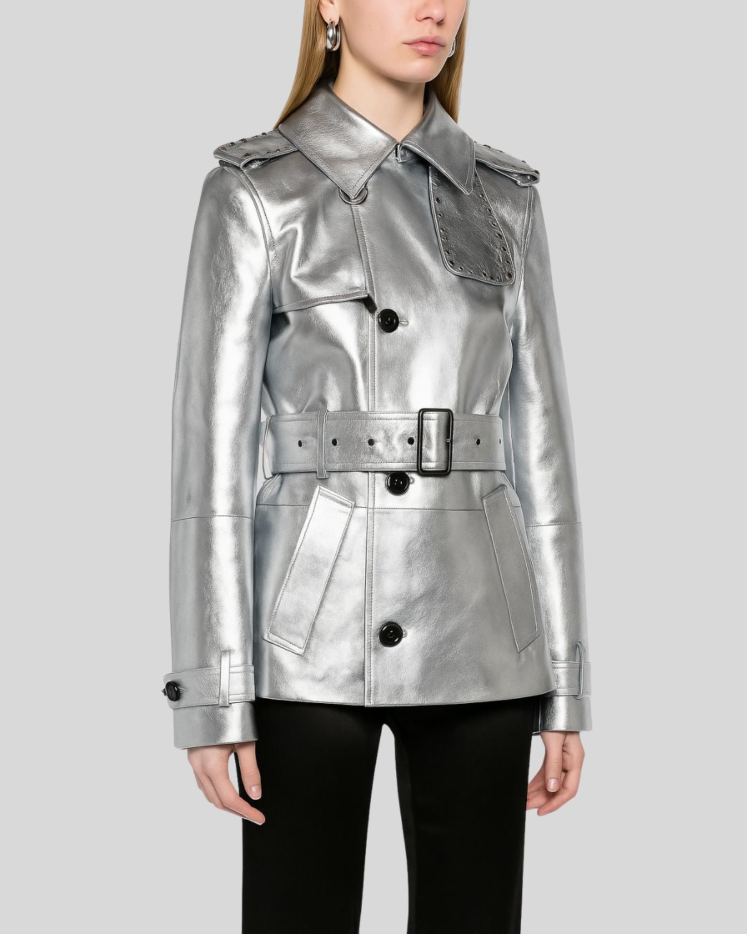 Side angle of belted metallic silver leather jacket womens