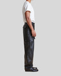 side profile of black leather pants with cargo pockets – Night Ops
