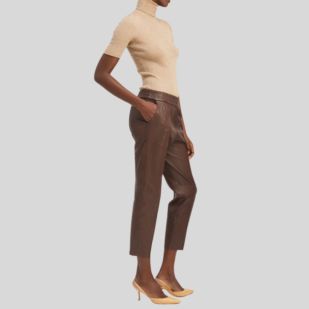 Side view of high rise brown pants in lambskin leather