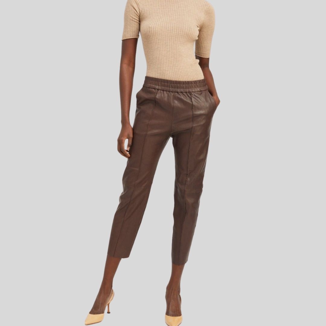 Front view of cropped brown leather pants womens