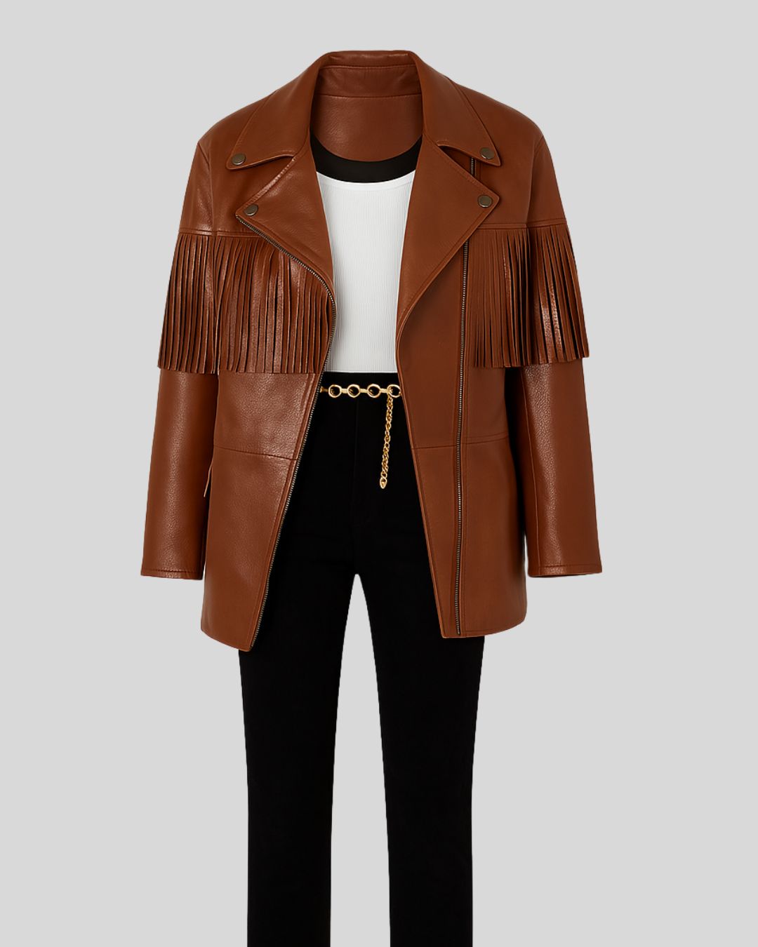  Flat lay of Sierra brown leather fringe jacket with black pants and white top
