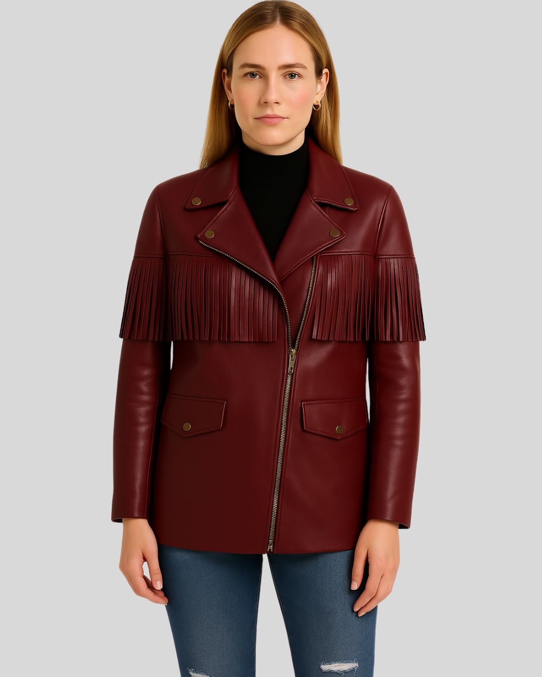  Woman wearing burgundy fringe leather jacket, front view
