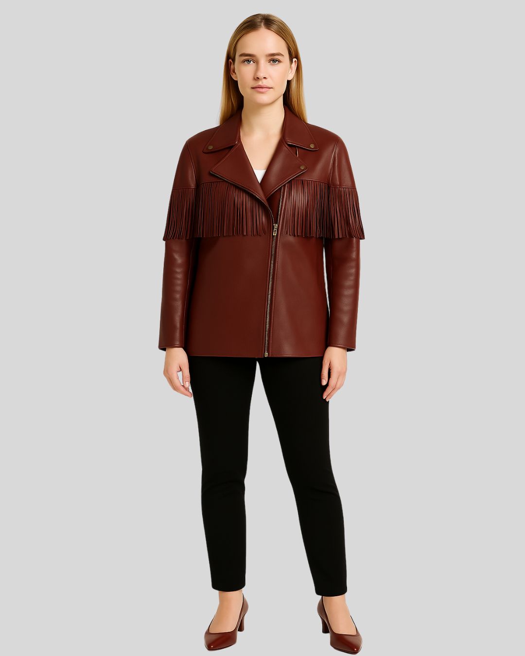 Full outfit shot of burgundy leather fringe jacket on woman
