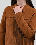  Tan suede fringe jacket worn with collar exposed and fringe on sleeve
