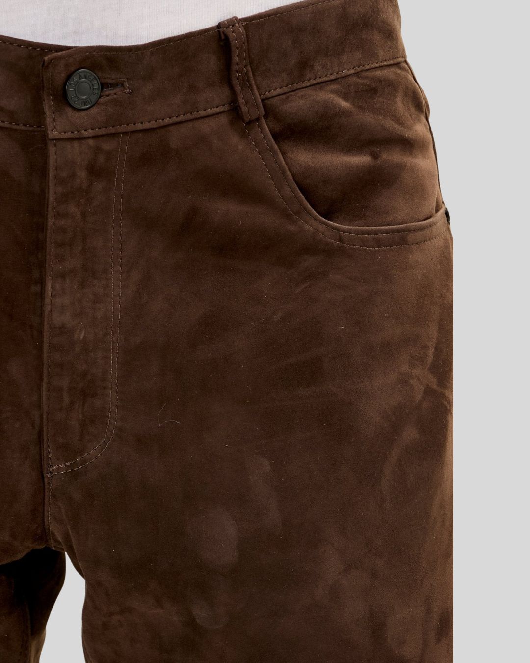 close view of men's dark brown suede pants slim fit