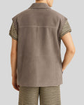 Rear view of men’s taupe suede vest