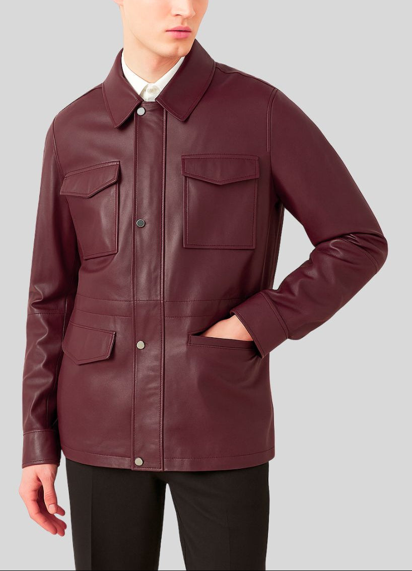 Burgundy leather jacket with hand in pocket close-up