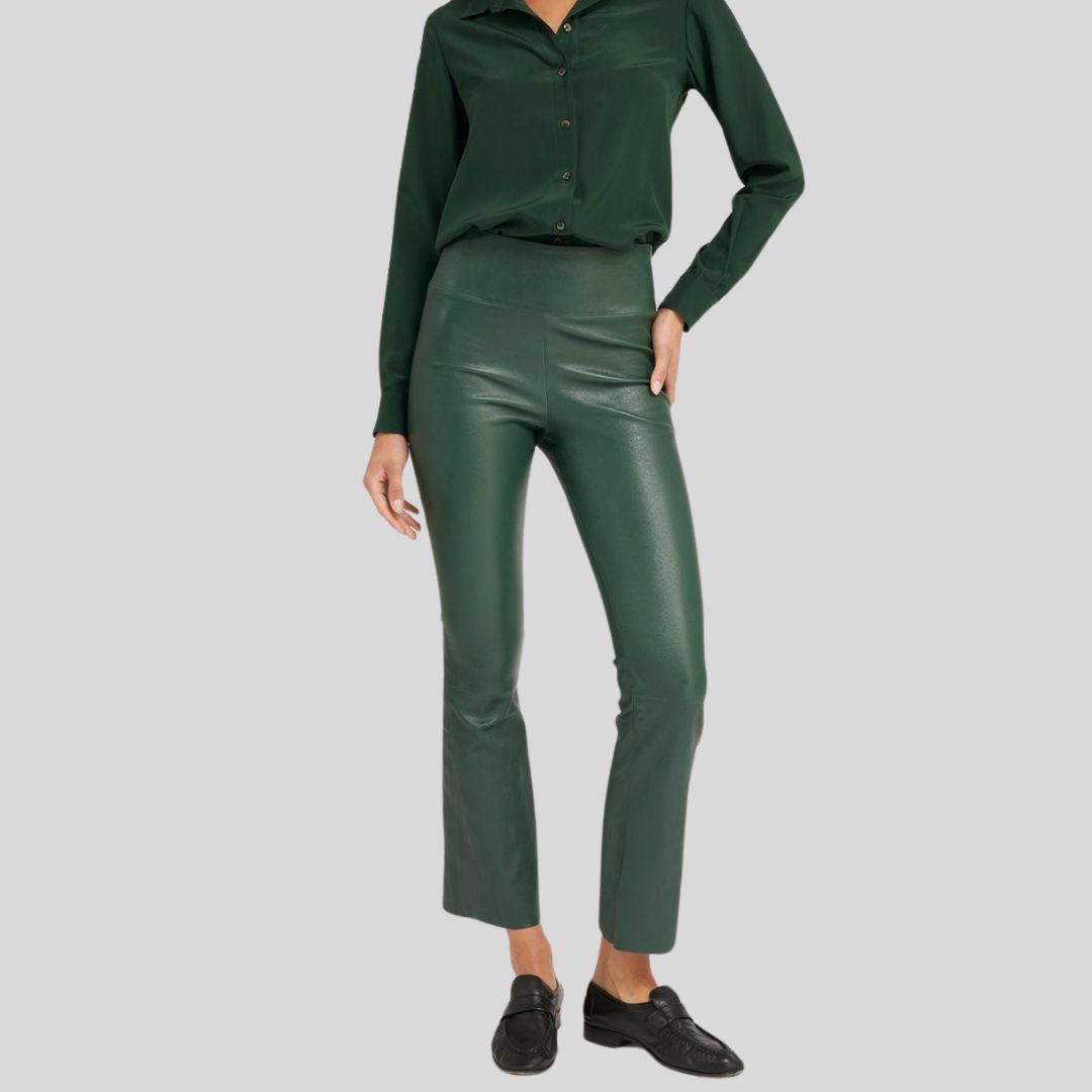 styled front pose in women's green leather pants