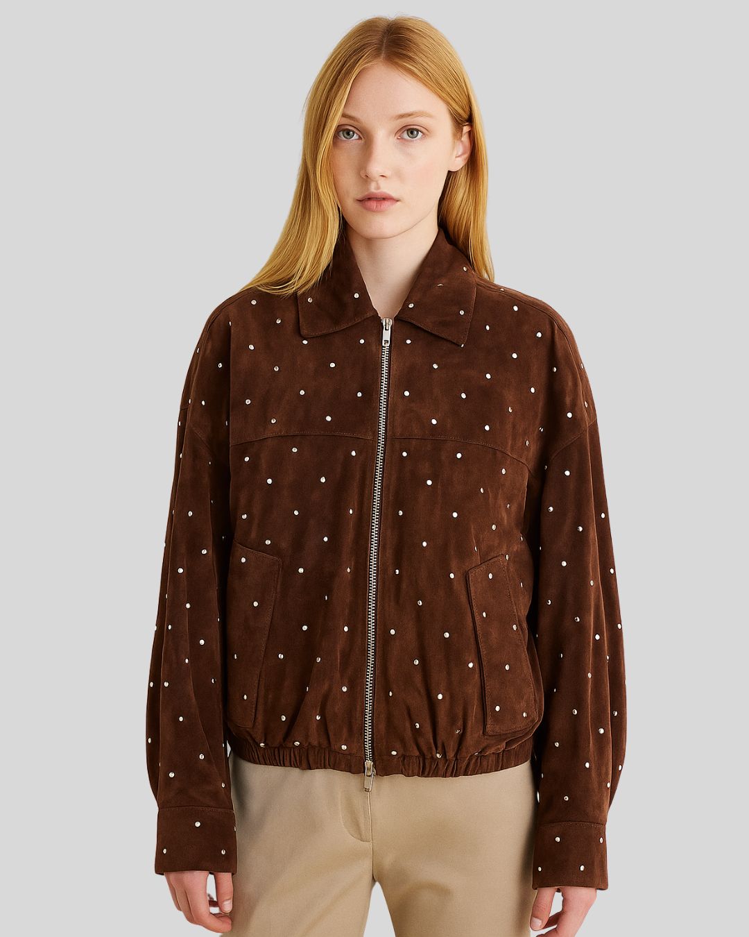 Back view of brown suede bomber jacket with studded embellishments