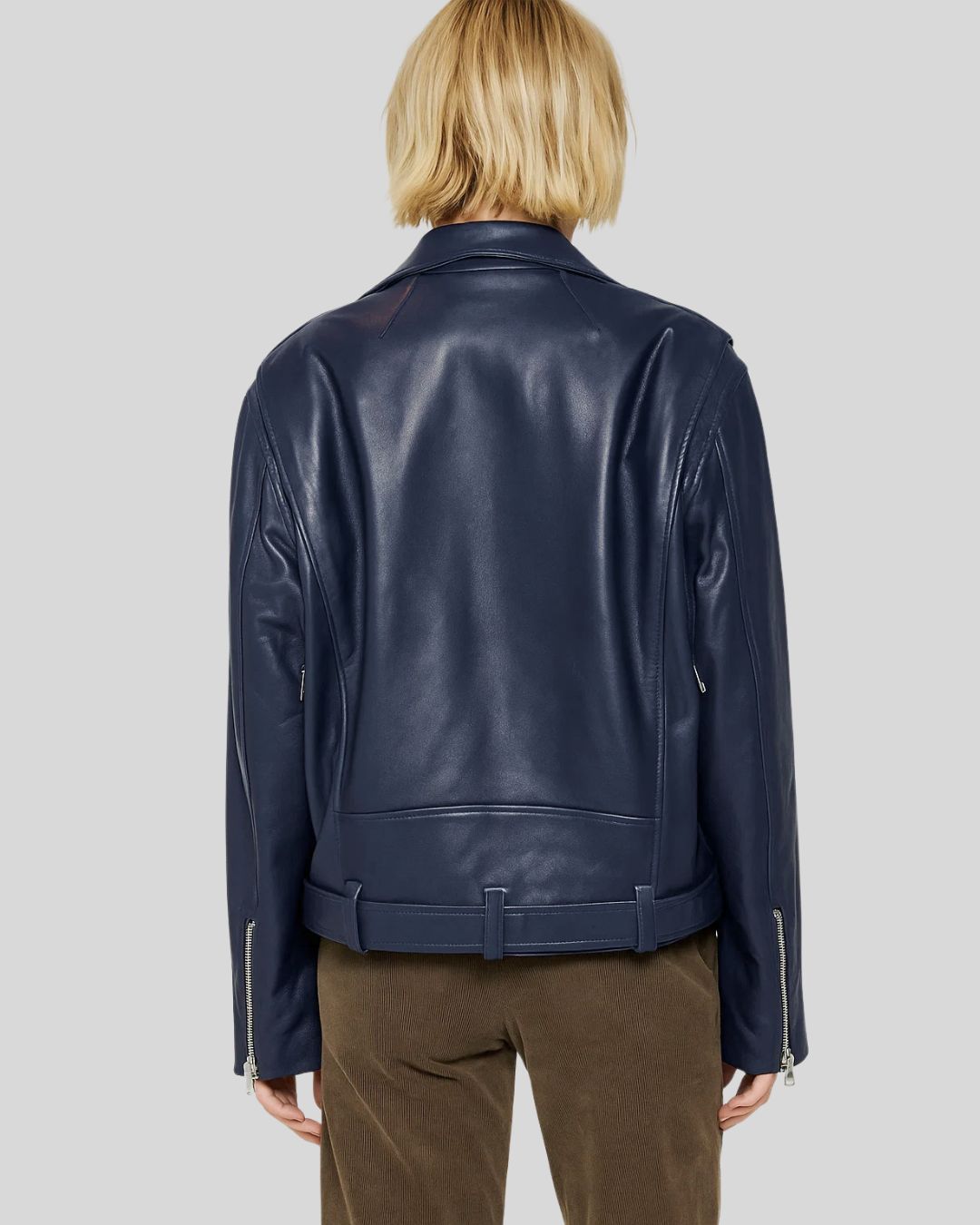 Navy blue leather biker jacket for women – back view with clean paneling and epaulets