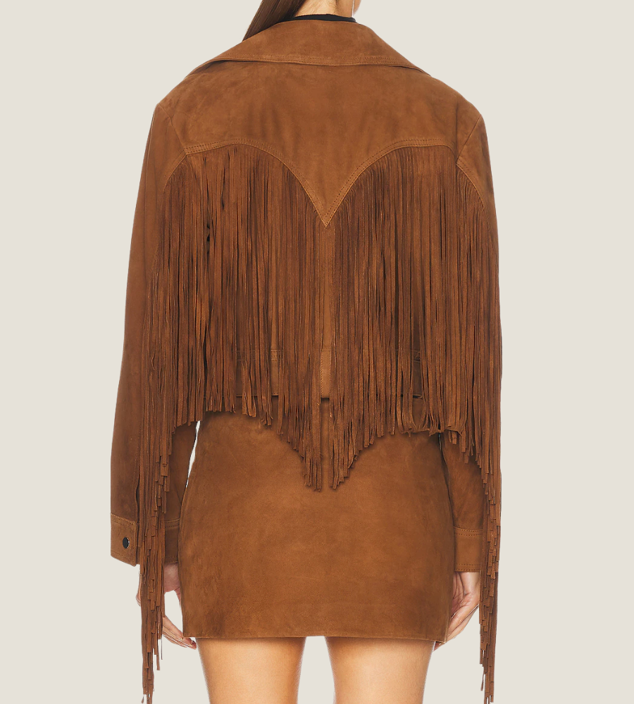 Brown suede jacket with fringes on a plain background